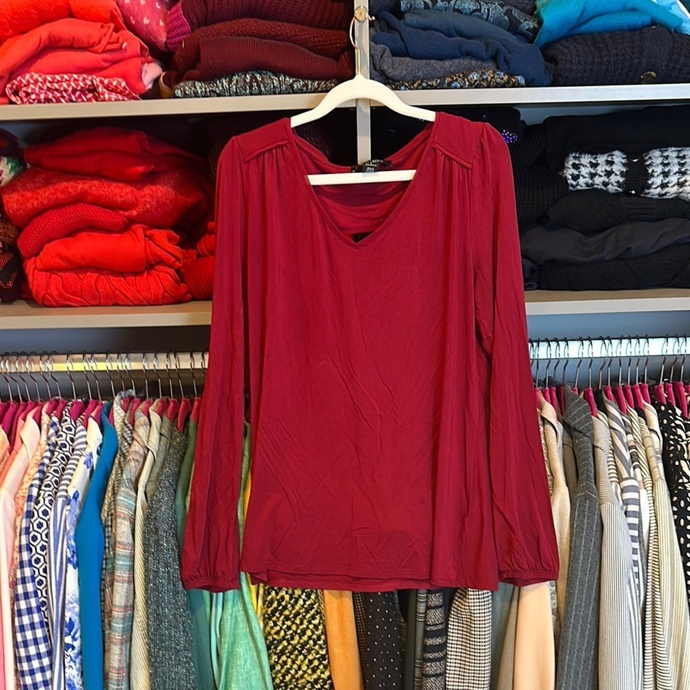 WHBM maroon long sleeve back cut out top size S
